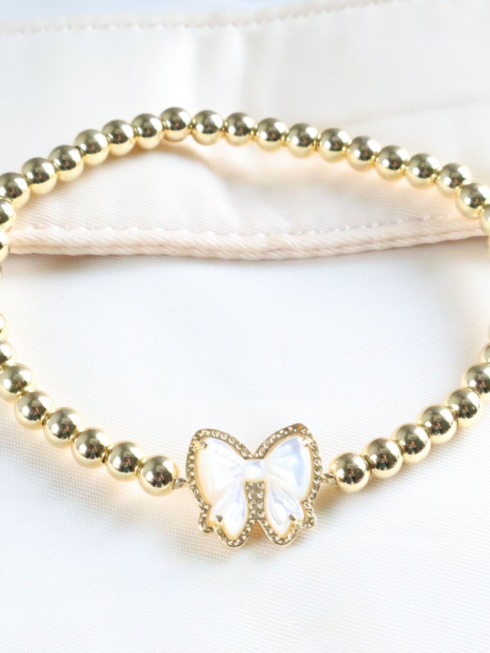 Kendra Scott Stretch Bracelet - Haley Bow - Mother-of-Pearl Gold